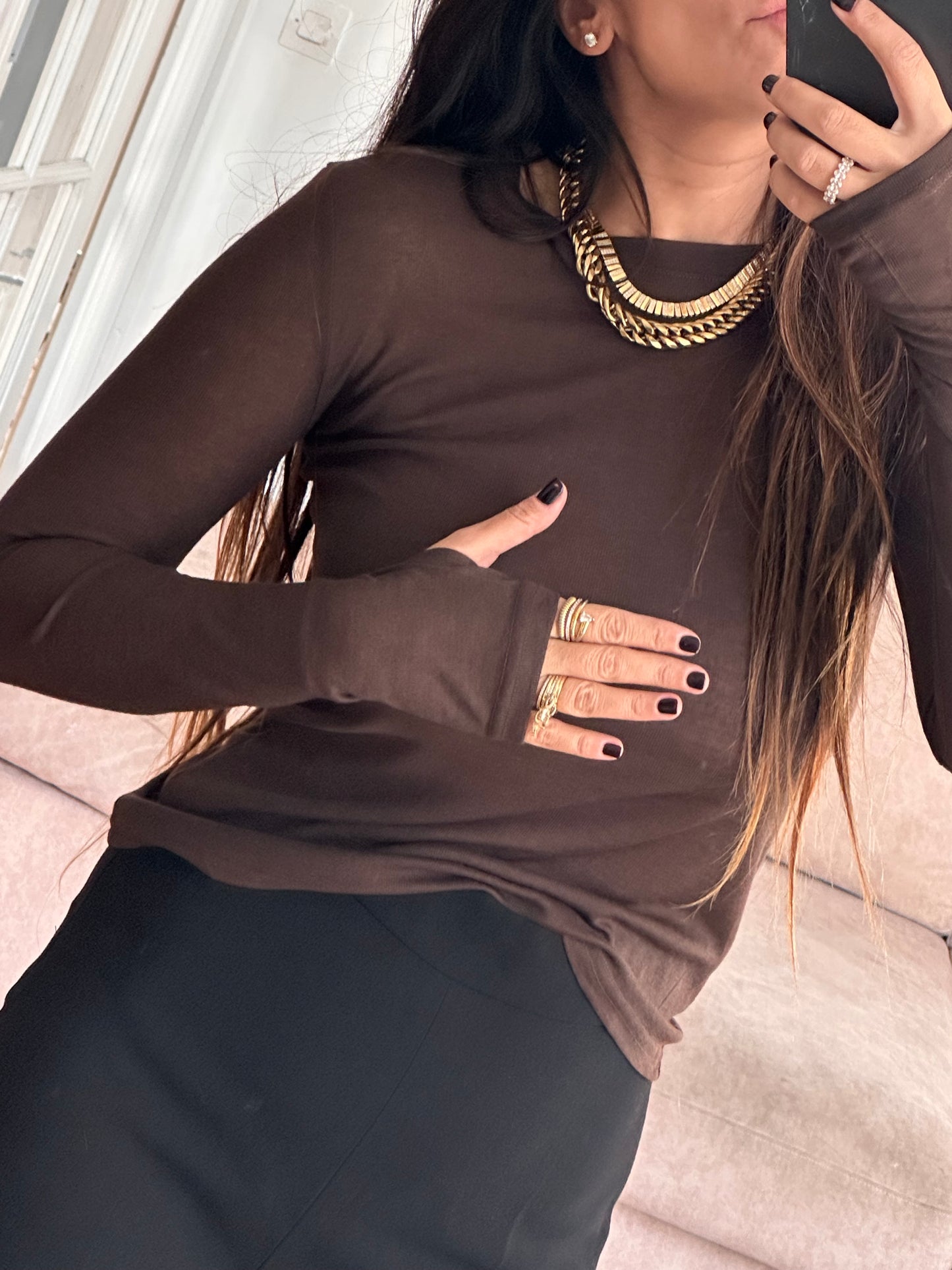 Top mila