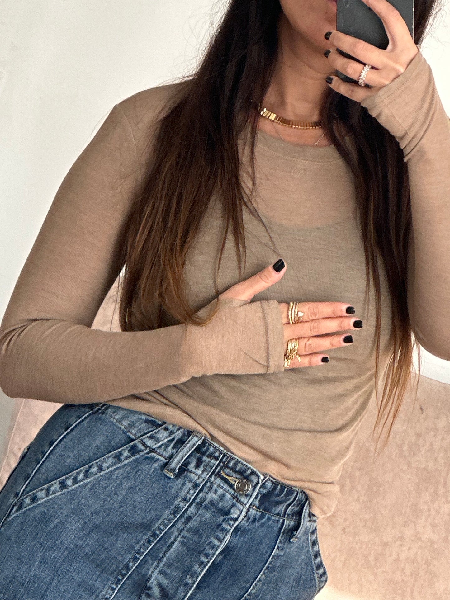 Top mila