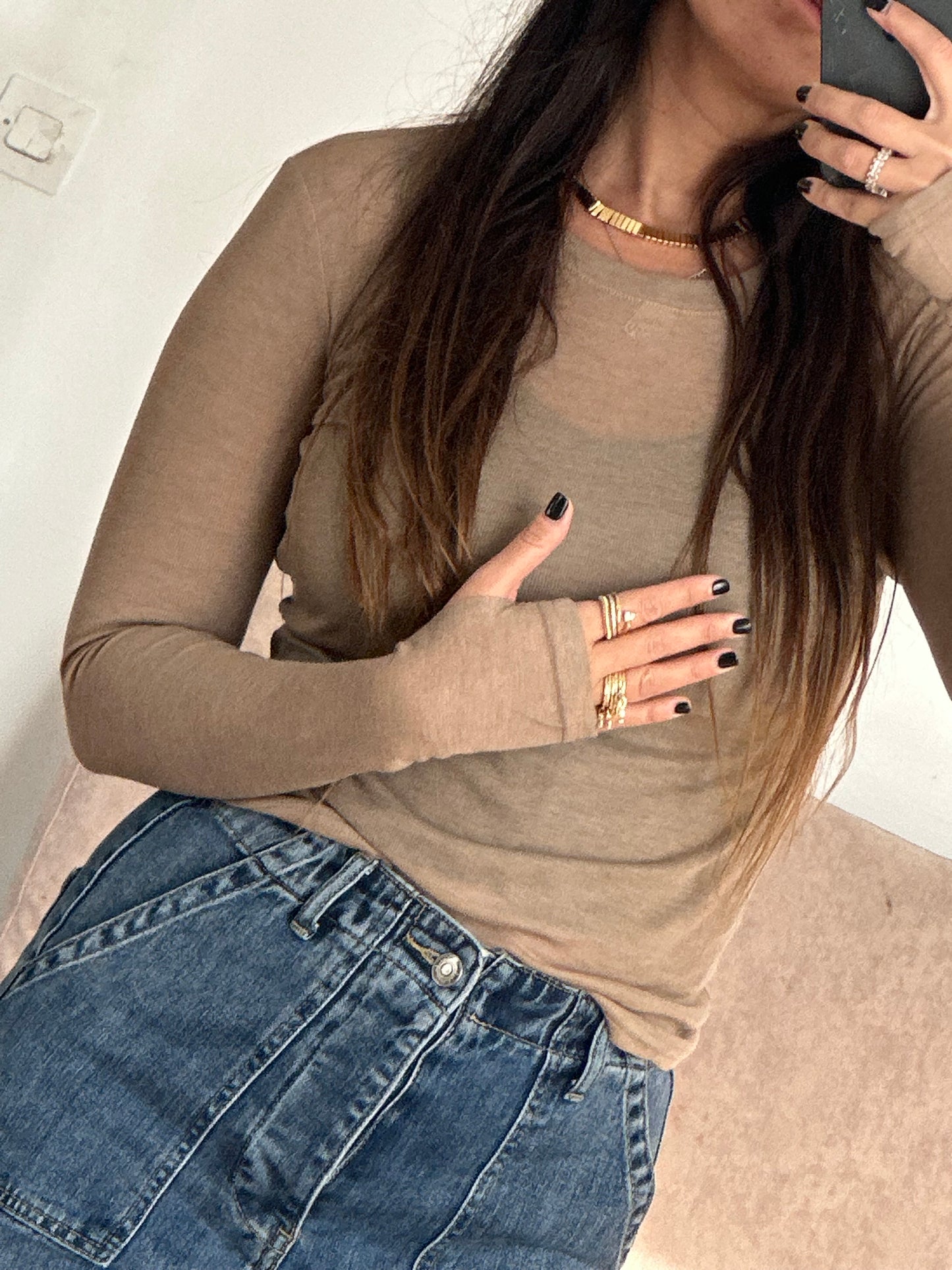 Top mila